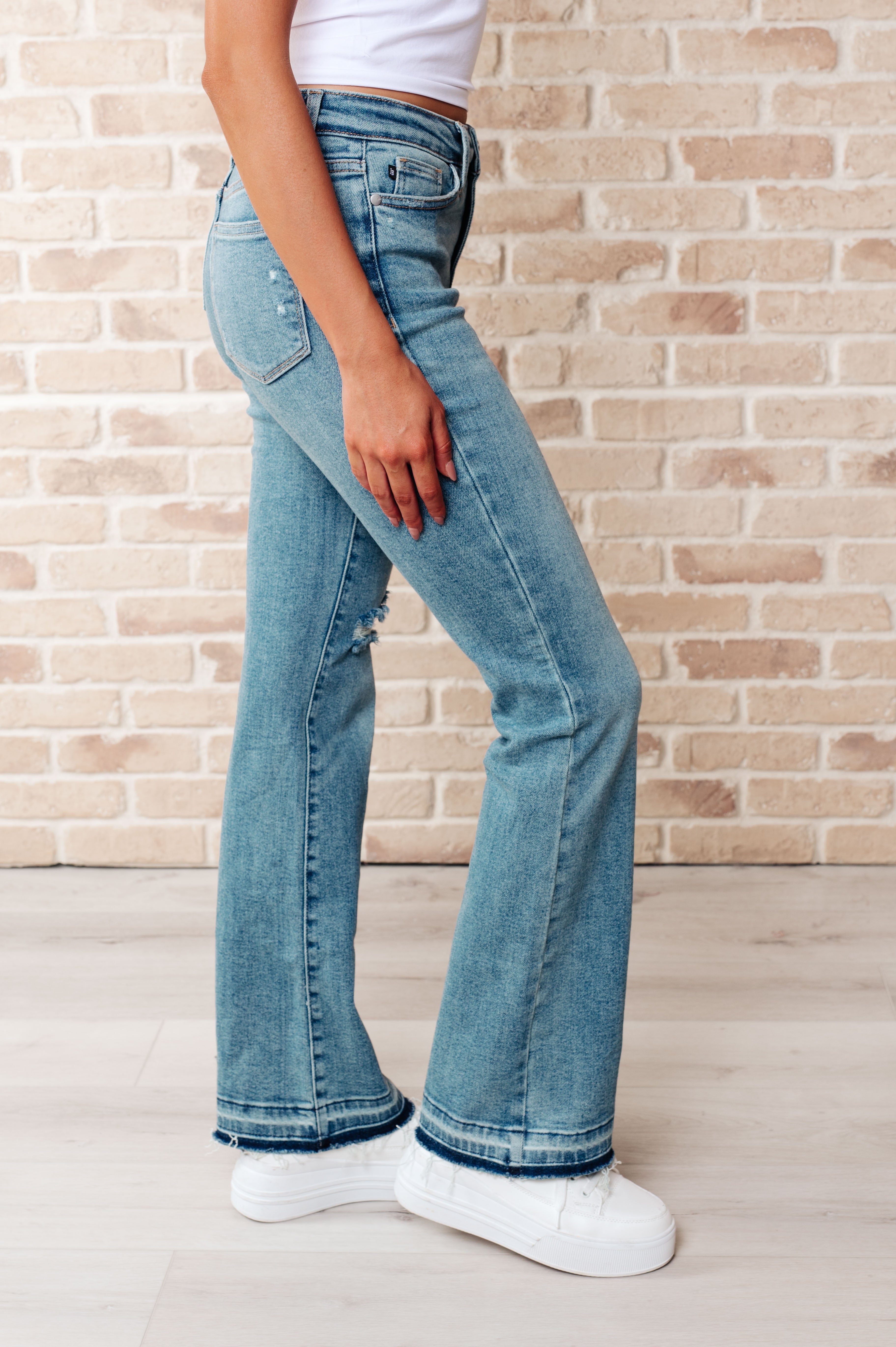 Judy Blue Isla Mid Rise Distressed Released Hem Bootcut Jeans Jeans