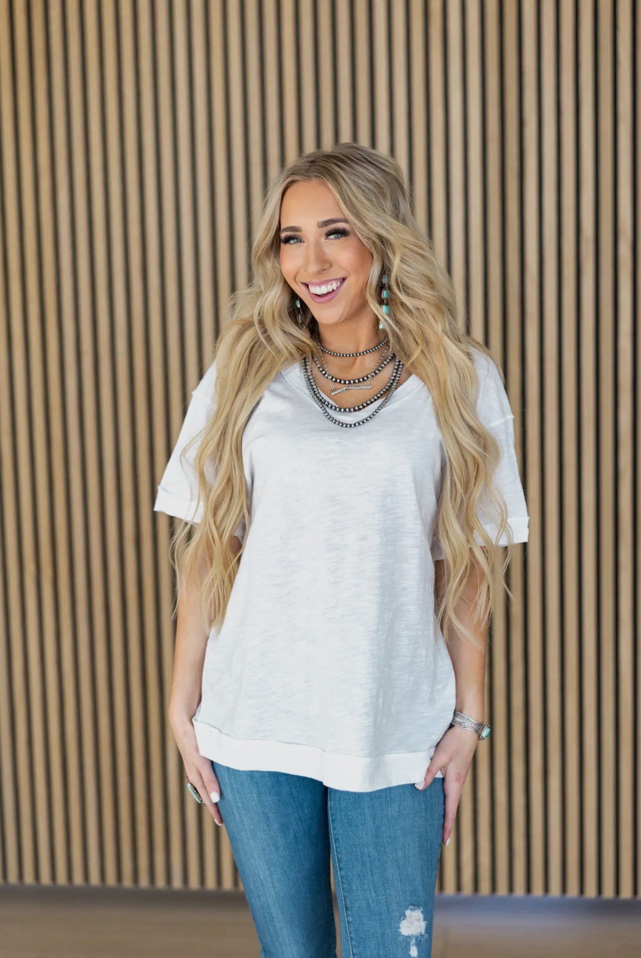 Andree by Unit Basic Instinct Drop Shoulder V-Neck Raw Edge Tee in Ivory Womens