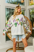 BiBi Off White Fleur De Lis Sleeve Mardi Gras Pullover