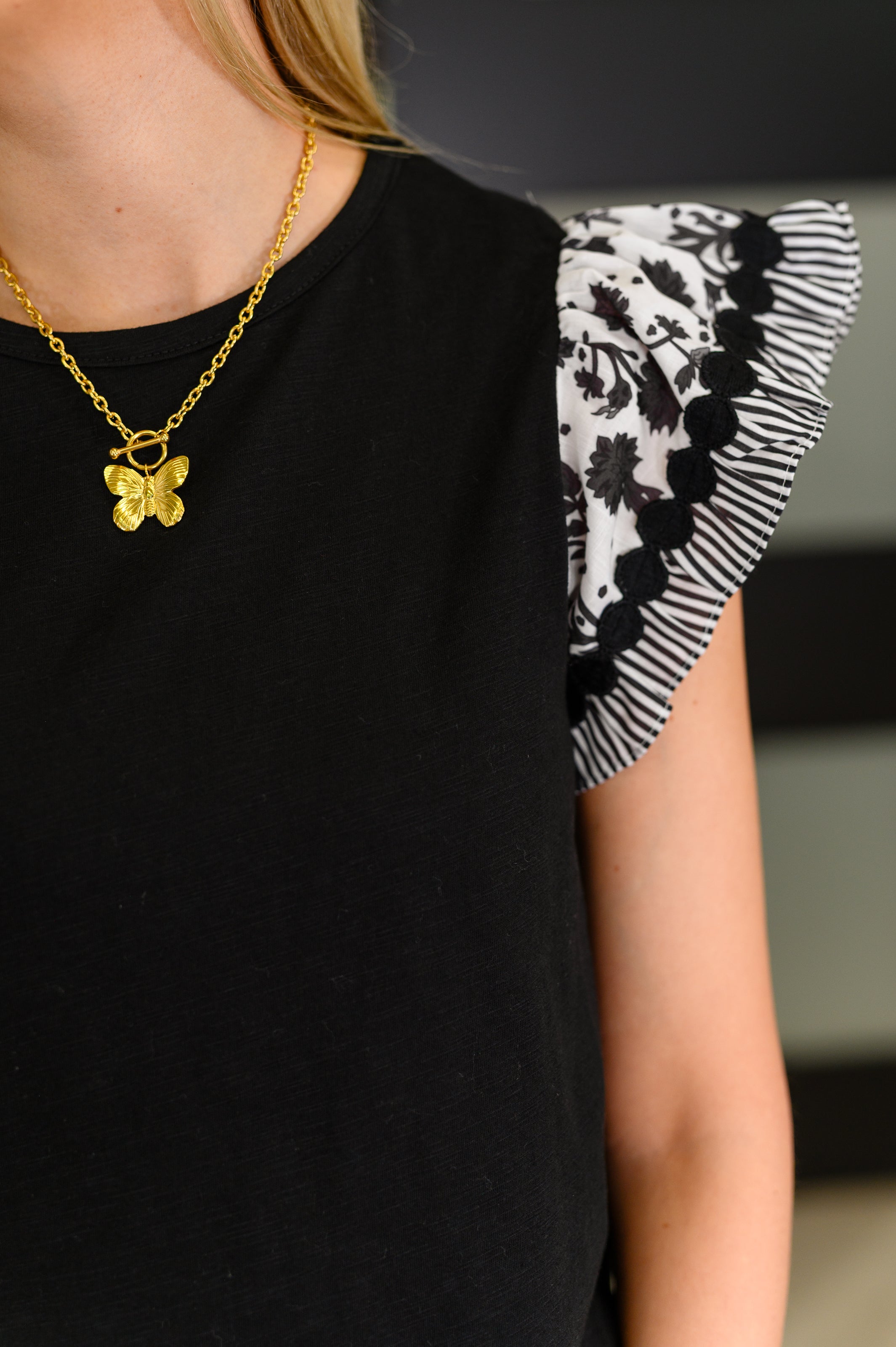 One Eleven North Contrast Flutter Sleeve Top in Black Womens