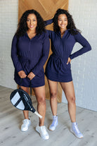 Rae Mode Getting Out Long Sleeve Hoodie Romper in Navy Jumpsuits & Rompers