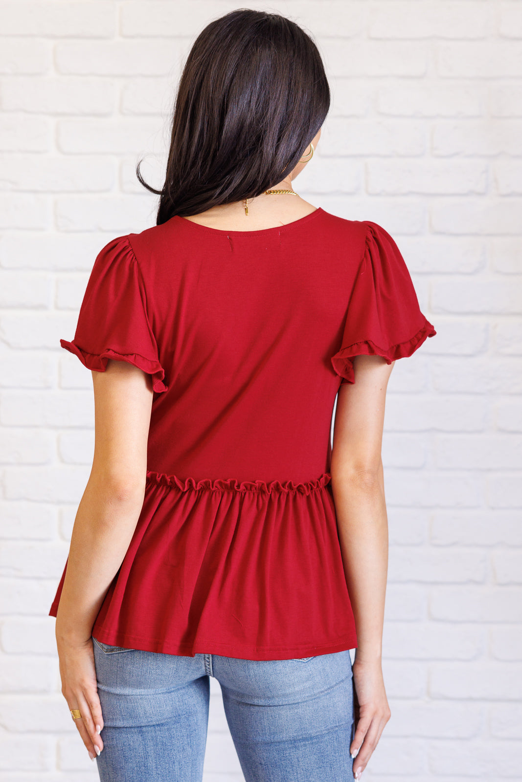 One Eleven North One Day Soon V-Neck Ruffle Detail Top in Wine Tops