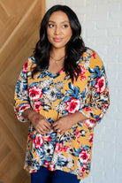 Dear Scarlett V-Neck Scoop Hem Top in Marigold Floral Shirts & Tops