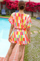 Haptics Eyes On You Coral & Yellow Geo Abstract Surplice Woven Romper Final Sale Haptics