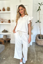 Double Take Geometric Textured Ruffle Short Sleeve Top and Wide Leg Pants Set Loungewear