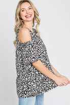 Heimish Ivory and Black Leopard Round Neck Cold Shoulder Top