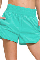 Zenana Turquoise Windbreaker Smocked Waistband Running Shorts