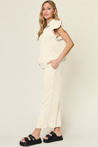 Double Take Quilted Textured Ruffle Short Sleeve Top and Drawstring Wide Leg Pants Set Trendsi