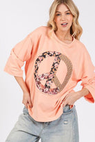 SAGE + FIG Peach Floral Peace Patch Round Neck Top