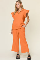 Double Take Quilted Textured Ruffle Short Sleeve Top and Drawstring Wide Leg Pants Set Tangerine Trendsi