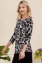 Celeste Leopard Print Round Neck Three-Quarter Sleeve Top Shirts & Tops