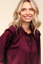 Haptics Holiday Vibes Burgundy Frill Detail Tie Neck Satin Top