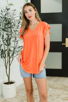 Heimish Flirtini Flutter Sleeve Top in Neon Coral Womens