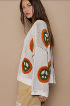 POL Cream V Neck Long Sleeve Peace Pattern Sweater Trendsi