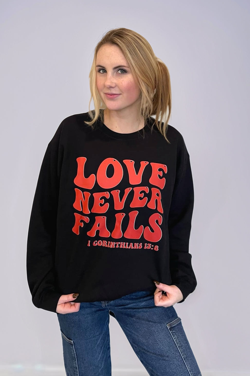 Love Never Fails Sweatshirt Graphic/Graphic Sweatshirts