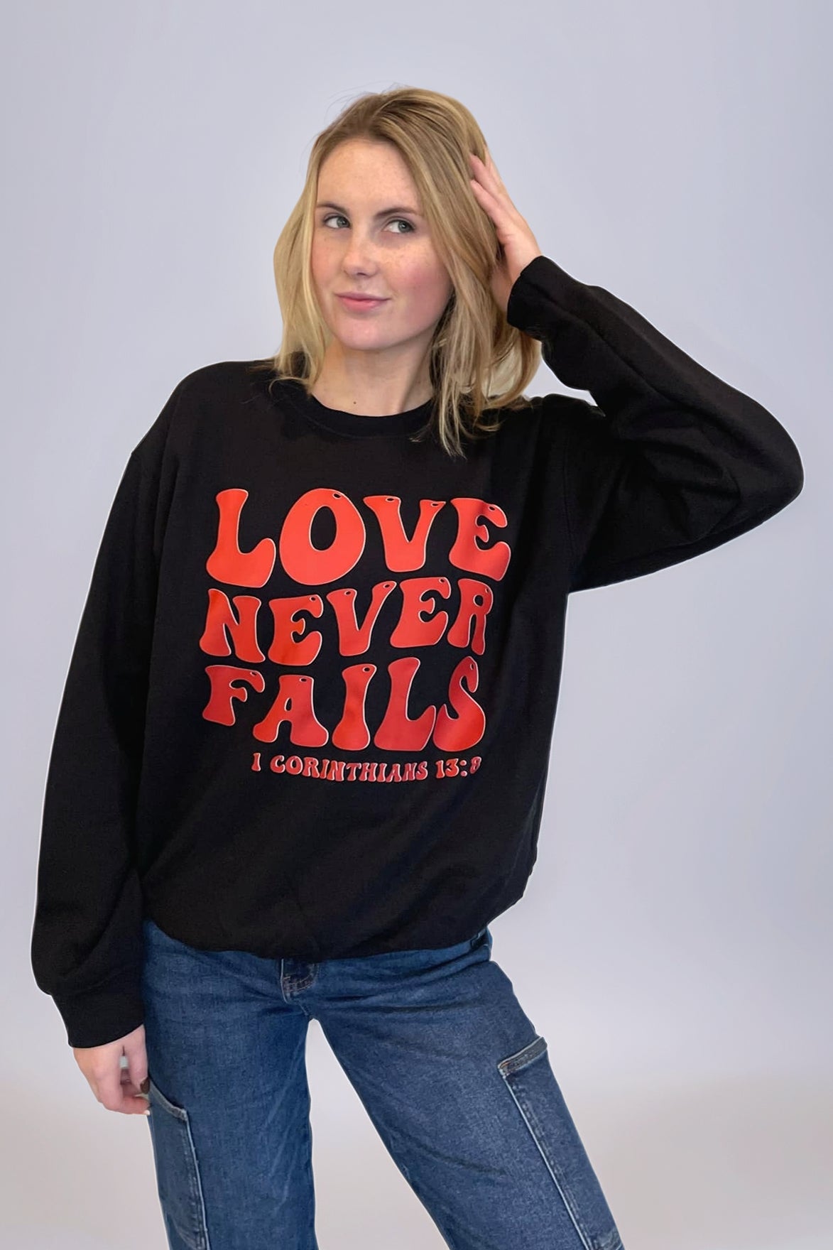 Love Never Fails Sweatshirt Graphic/Graphic Sweatshirts