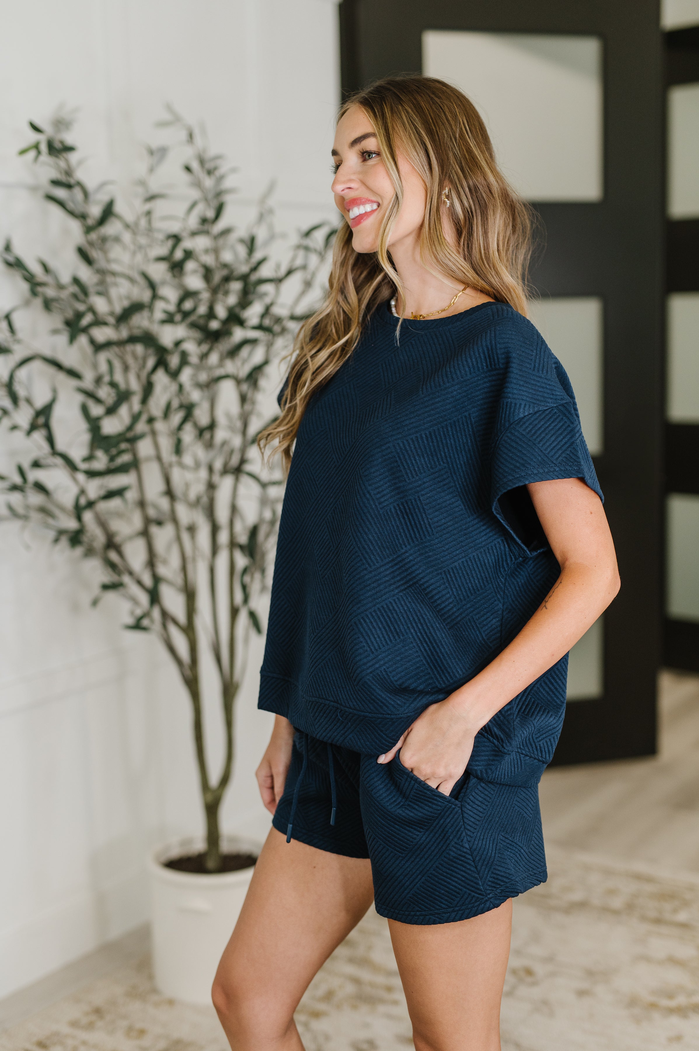 See and be Seen Love on the Loose Quilted Top in Navy Womens