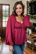 Davi & Dani Burgundy Miracles Are Upon Us Babydoll Top BoutiqueSimplified