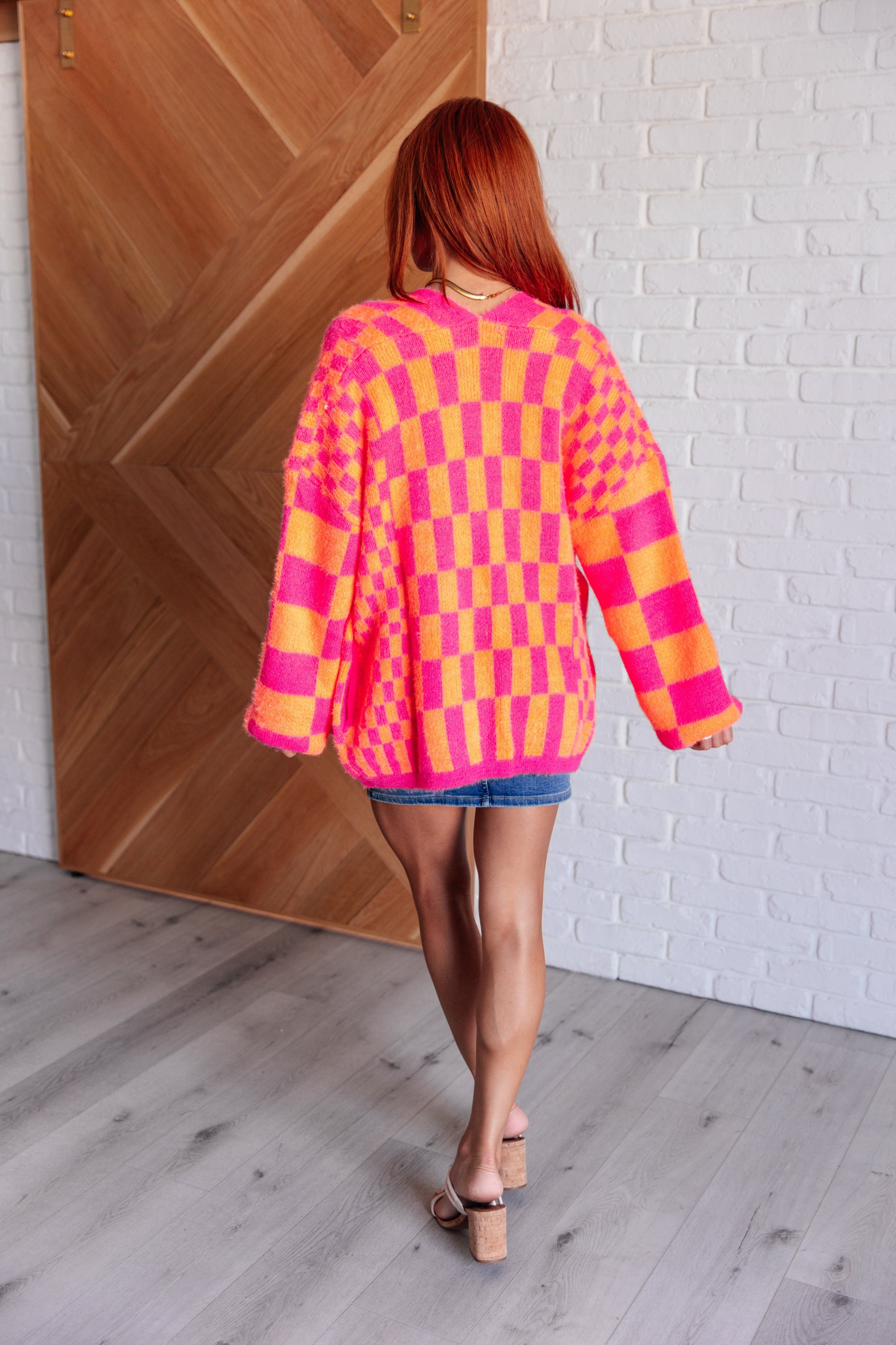 Davi & Dani Noticed in Neon Checkered Cardigan in Pink and Orange Ave Shops