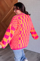 Davi & Dani Noticed in Neon Checkered Cardigan in Pink and Orange Ave Shops