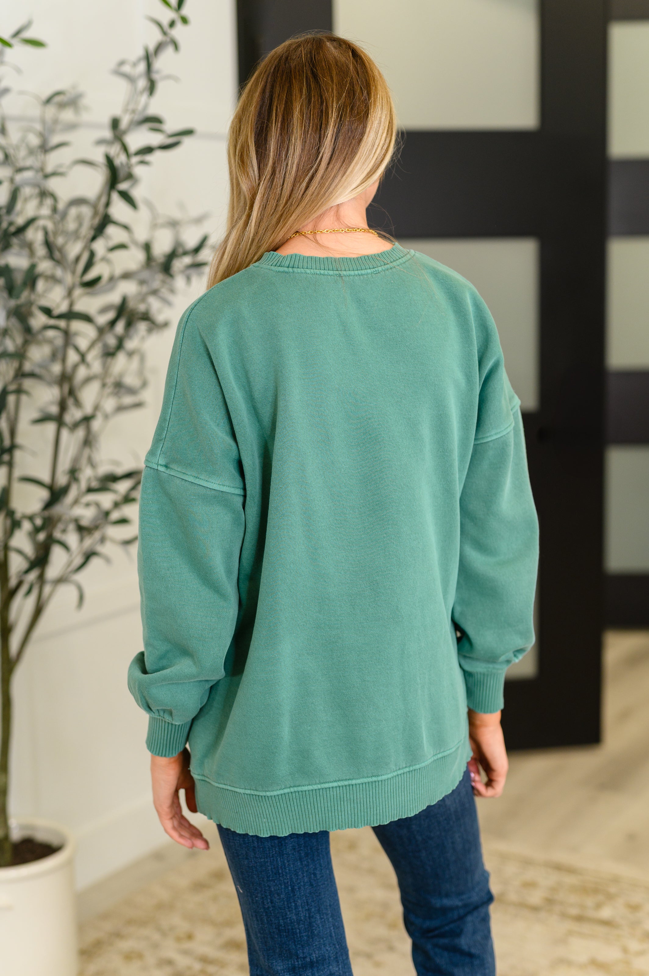Talk Cozy to Me Stepped Hem Pullover in Dark Green Womens