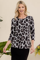 Celeste Leopard Print Round Neck Three-Quarter Sleeve Top Leopard Shirts & Tops