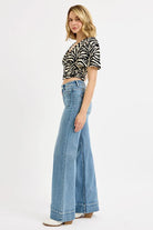 RISEN Medium Washed High Rise Wide Flare Patch Pocket Jeans