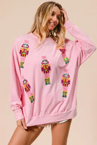 BiBi Light Pink Sequin Nutcrackers Embroidery Christmas Sweatshirt
