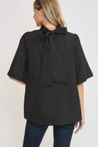 Umgee Bow Tie Back Mock Neck Half Sleeve Blouse in Black Shirts & Tops