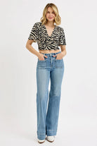RISEN Medium Washed High Rise Wide Flare Patch Pocket Jeans