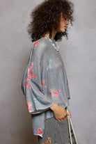 POL Heather Grey Butterflies Pattern Round Neck knit Top with Outseam Rolling Edge