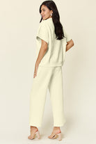 Double Take Quilted Textured Half Zip Short Sleeve Top and Pants Set Trendsi